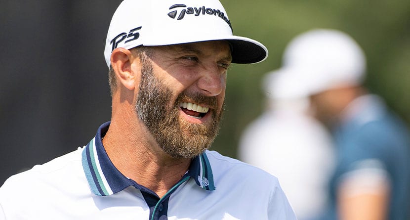 Captain Dustin Johnson of 4Aces GC laughs on the practice putting green during the second round of LIV Golf Andalucía at the Real Club Valderrama on Saturday, July 01, 2023 in San Roque, Spain. (Photo by Matthew Harris/LIV Golf via AP)