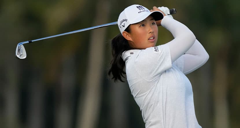 Ruoning Yin, of China, hits from the 18th fairway during the first round of the LPGA CME Group Tour Championship golf tournament, Thursday, Nov. 16, 2023, in Naples, Fla. (AP Photo/Lynne Sladky)