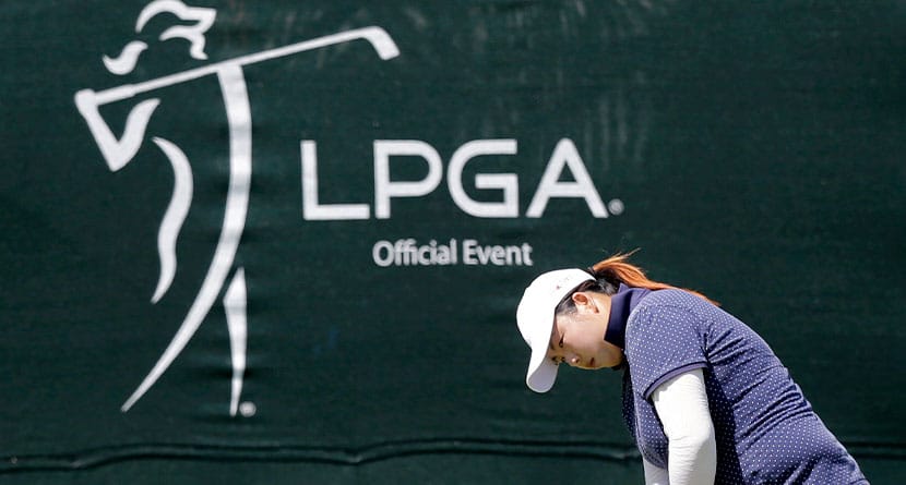 Shanshan Feng, of China, putts on the 18th hole during the second round of the ShopRite LPGA Classic golf tournament in Galloway Township, N.J., Saturday, June 1, 2013. (AP Photo/Mel Evans)