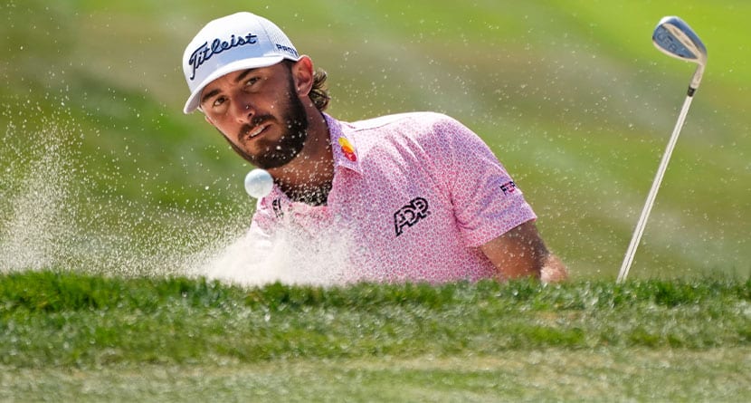 Max Homa follows his shot out of a bunker up to the first green of the Silverado Resort North Course during the final round of the Fortinet Championship PGA golf tournament in Napa, Calif., Sunday, Sept. 17, 2023. (AP Photo/Eric Risberg)
