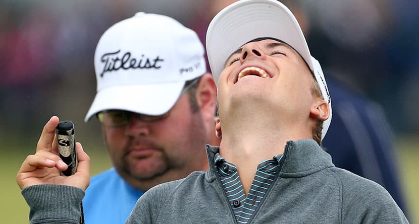 United States’ Jordan Spieth laughs during a practice round at the British Open Golf Championship at the Old Course, St. Andrews, Scotland, Wednesday, July 15, 2015. (AP Photo/Peter Morrison)