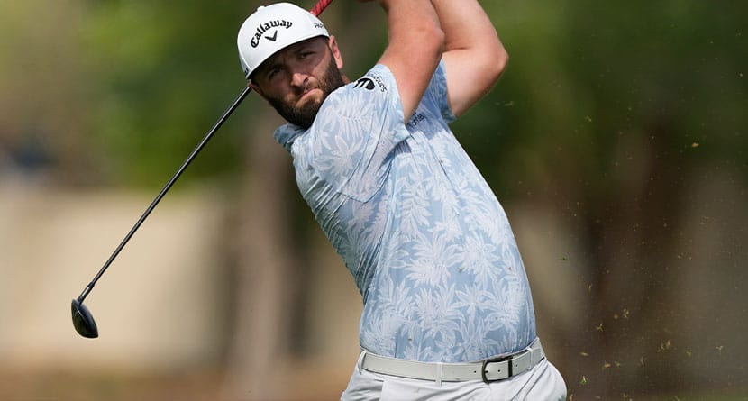 Jon Rahm from Spain plays his second shot on the second hole during the round one of the DP World Tour Championship golf tournament, in Dubai, United Arab Emirates, Thursday, Nov. 16, 2023. (AP Photo/Kamran Jebreili)