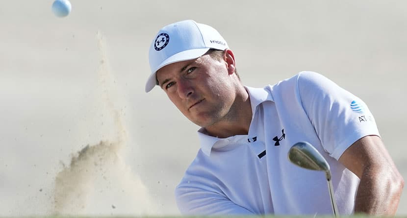 Jordan Spieth, of the United States, watches his hit from the sand on the third hole during the third round of the Hero World Challenge PGA Tour at the Albany Golf Club, in New Providence, Bahamas, Saturday, Dec. 2, 2023. (AP Photo/Fernando Llano)