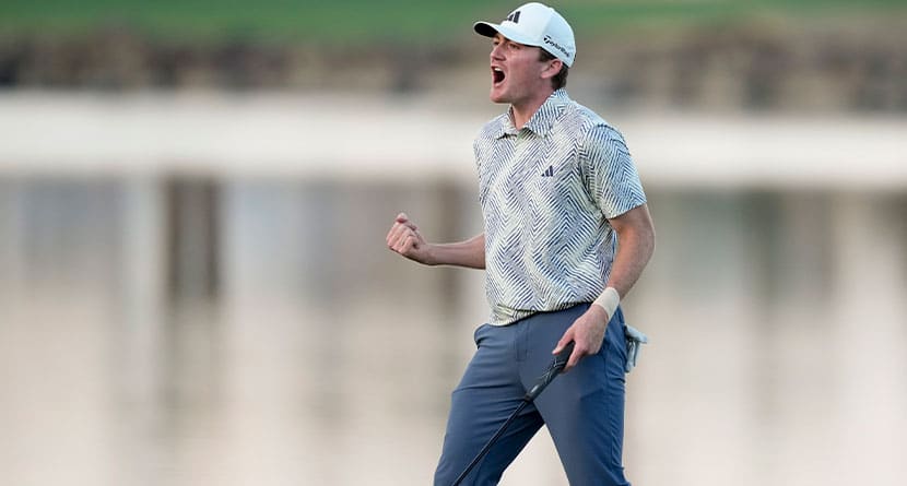 Nick Dunlap reacts after making his putt on the 18th hole of the Pete Dye Stadium Course during the final round to win the American Express golf tournament, Sunday, Jan. 21, 2024, in La Quinta, Calif. (AP Photo/Ryan Sun)