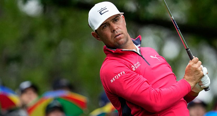 Gary Woodland watches his tee shot on the fourth hole during the weather-delayed third round of the Masters golf tournament at Augusta National Golf Club on April 8, 2023, in Augusta, Ga. Woodland returns to competition at the Sony Open following Sept. 18, 2023, brain surgery. (AP Photo/Mark Baker, File)
