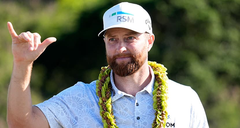 Chris Kirk motions on the 18th green after the final round of The Sentry golf event, Sunday, Jan. 7, 2024, at Kapalua Plantation Course in Kapalua, Hawaii. (AP Photo/Matt York)