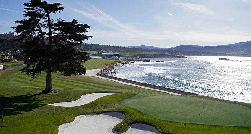 Waves roll in along the 18th hole of the Pebble Beach Golf Links during a practice round of the AT&T Pebble Beach Pro-Am golf tournament in Pebble Beach, Calif., Wednesday, Feb. 1, 2023. (AP Photo/Eric Risberg)