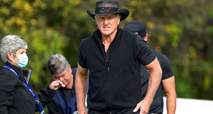 Greg Norman, of Australia, walks on the first hole after hitting his tee shot during the final round of the PNC Championship golf tournament, Sunday, Dec. 20, 2020, in Orlando, Fla. (AP Photo/Phelan M. Ebenhack)