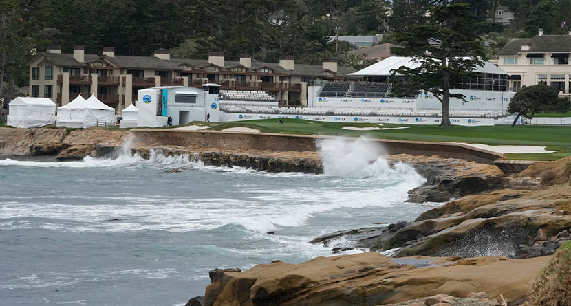 Waves crash against the sea wall along the 18th hole of the Pebble Beach Golf Links during a practice round of the AT&T Pebble Beach National Pro-Am golf tournament in Pebble Beach, Calif., Wednesday, Jan. 31, 2024. (AP Photo/Eric Risberg)
