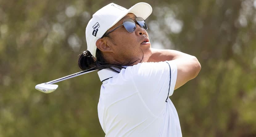 Wild Card player Anthony Kim hits his shot on the third hole during the first round of LIV Golf Jeddah at the Royal Greens Golf & Country Club on Friday, March 01, 2024 in King Abdullah Economic City, Saudi Arabia. (Photo by Chris Trotman/LIV Golf via AP)