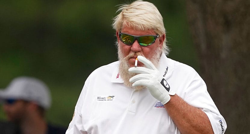 John Daly smokes on the 11th hole during the second round of the PGA Championship golf tournament at Southern Hills Country Club, Friday, May 20, 2022, in Tulsa, Okla. (AP Photo/Matt York)