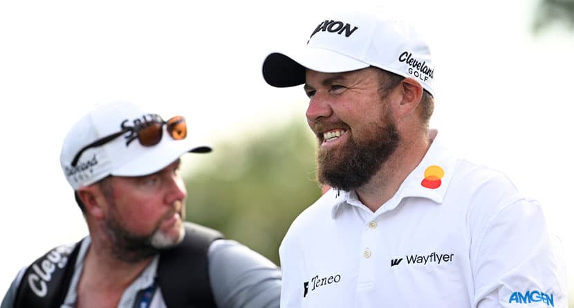 Shane Lowry, right, of Ireland, walks on the 11th fairway after hitting his tee shot during the first round of the Arnold Palmer Invitational golf tournament, Thursday, March 7, 2024, in Orlando, Fla. (AP Photo/Phelan M. Ebenhack)