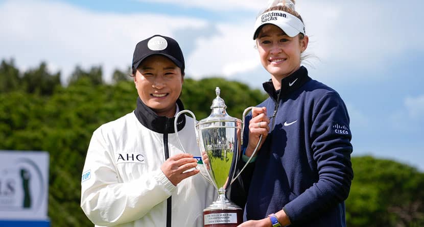Nelly Korda, right, holds up the trophy with Seri Pak, left,of South Korea, after winning the final round of LPGA's Fir Hills Seri Pak Championship golf tournament Sunday, March 24, 2024, in Palos Verdes Estates, Calif. (AP Photo/Ryan Sun)