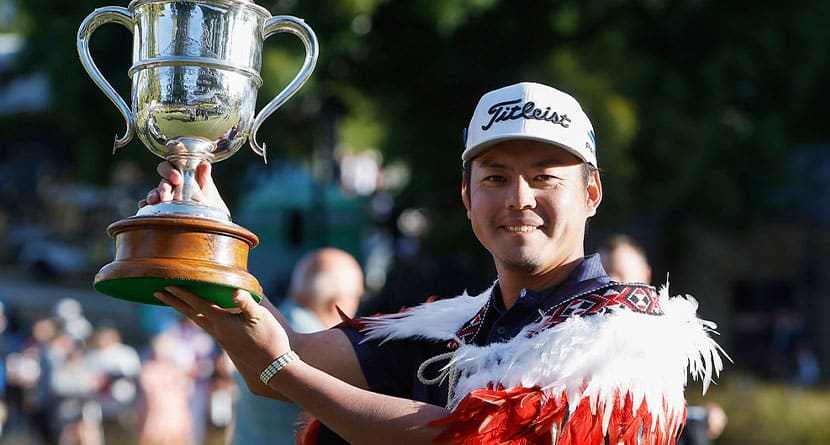 Japan's Takahiro Hataji holds his trophy aloft after winning the New Zealand Golf Open at the Millbrook Resort, in Arrowtown, New Zealand, Sunday, March 3, 2024. (Evan Barnes/Photosport via AP)
