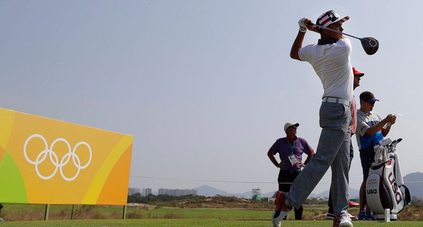 Rickie Fowler, of the United States, plays his tee shot on the ninth hole during a practice round for the men's golf event at the 2016 Summer Olympics in Rio de Janeiro, Brazil, Tuesday, Aug. 9, 2016. (AP Photo/Alastair Grant)