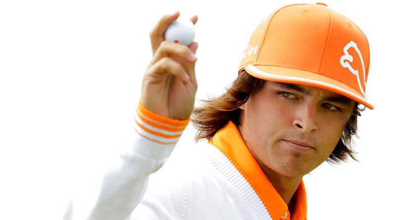 Rickie Fowler of the U.S. reacts after putting on the 3rd green during the final day of the British Open Golf Championship at Royal St George's golf course Sandwich, England, Sunday, July 17, 2011. (AP Photo/Matt Dunham)
