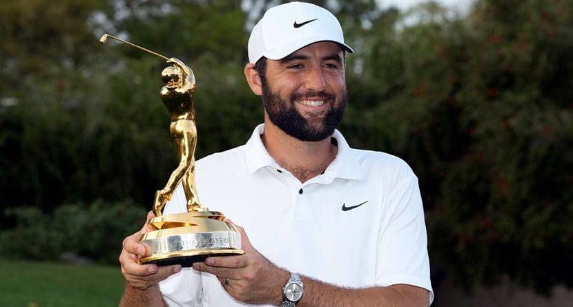 Scottie Scheffler holds up the trophy after winning The Players Championship golf tournament Sunday, March 17, 2024, in Ponte Vedra Beach, Fla. (AP Photo/Lynne Sladky)