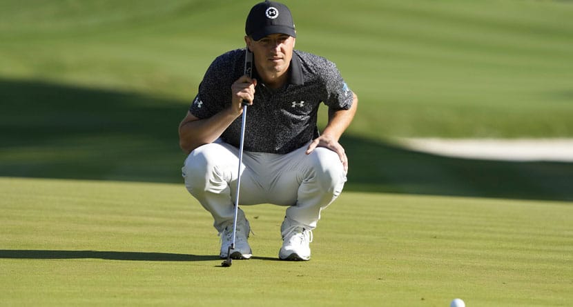 Jordan Spieth lines up a putt on the 14th green during the first round of The Players Championship golf tournament Thursday, March 14, 2024, in Ponte Vedra Beach, Fla. (AP Photo/Lynne Sladky)