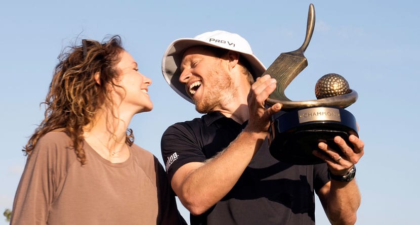 Peter Malnati celebrates with his wife Alicia after winning the Valspar Championship golf tournament Sunday, March 24, 2024, at Innisbrook in Palm Harbor, Fla. (AP Photo/Chris O'Meara)