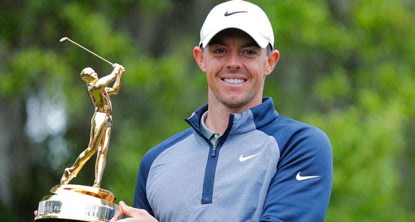 Rory McIlroy, of Northern Ireland, smiles as he holds the trophy for winning The Players Championship golf tournament Sunday, March 17, 2019, in Ponte Vedra Beach, Fla. (AP Photo/Lynne Sladky)