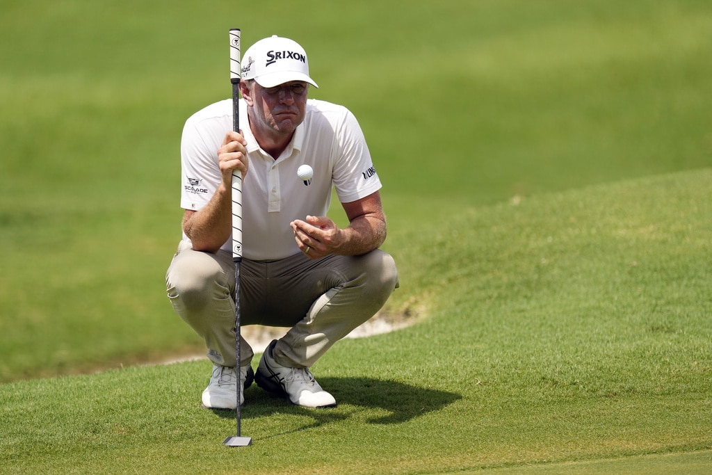 Lucas Glover juggles his ball on the seventh greenduring the second round of the St. Jude Championship golf tournament Friday, Aug. 11, 2023, in Memphis, Tenn. (AP Photo/George Walker IV)