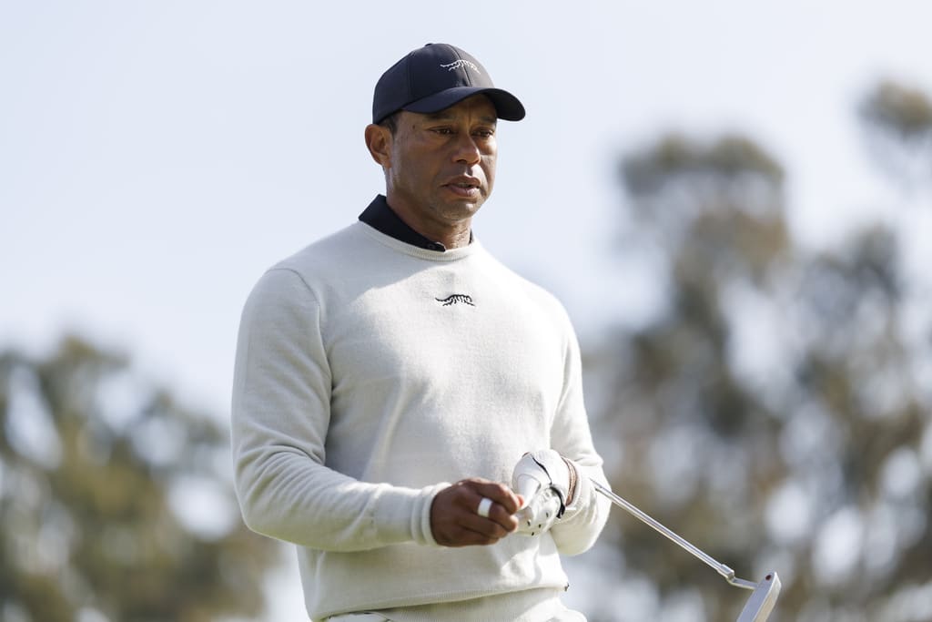Tiger Woods walks to the green on the third hole during the first round of the Genesis Invitational golf tournament at Riviera Country Club, Thursday, Feb. 15, 2024, in the Pacific Palisades area of Los Angeles. (AP Photo/Ryan Kang)