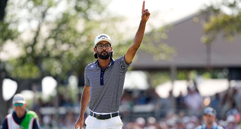Akshay Bhatia reacts to a birdie putt on the 18th hole during the final round of the Texas Open golf tournament, Sunday, April 7, 2024, in San Antonio. Bhatia defeated Denny McCarthy in a playoff. (AP Photo/Eric Gay)