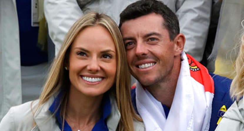 Europe's Rory McIlroy and his partner Erica Stoll, left, and Europe's Henrik Stenson and his wife Emma Lofgren celebrate after Europe won the Ryder Cup on the final day of the 42nd Ryder Cup at Le Golf National in Saint-Quentin-en-Yvelines, outside Paris, France, Sunday, Sept. 30, 2018. (AP Photo/Matt Dunham)