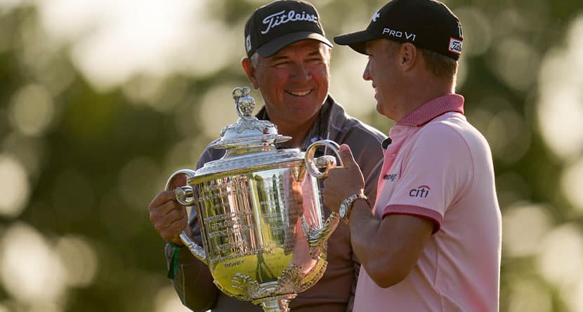 Justin Thomas poses with the Wanamaker Trophy with his dad Mike, after winning the PGA Championship golf tournament in a playoff against Will Zalatoris at Southern Hills Country Club, Sunday, May 22, 2022, in Tulsa, Okla. Thomas returns to his hometown of Louisville, Kentucky, on May 16-19, 2024, for the PGA Championship at Valhalla. (AP Photo/Sue Ogrocki, File)
