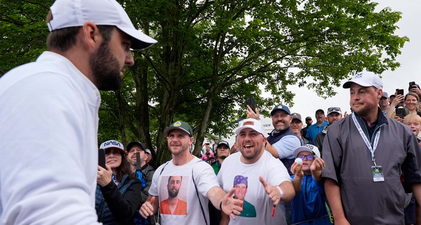 Scottie Scheffler is greeted by fans after the second round of the PGA Championship golf tournament at the Valhalla Golf Club, Friday, May 17, 2024, in Louisville, Ky. (AP Photo/Matt York)