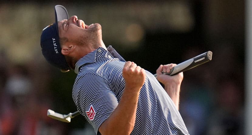 Bryson DeChambeau celebrates after winning the U.S. Open golf tournament Sunday, June 16, 2024, in Pinehurst, N.C. (AP Photo/Mike Stewart)