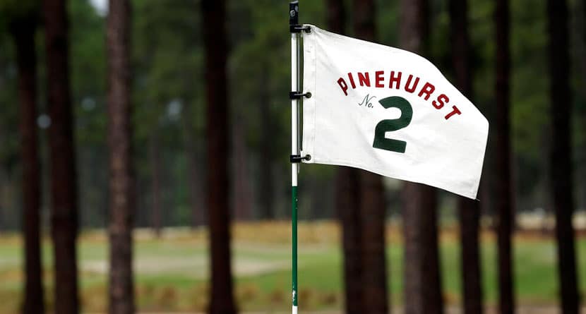 In this April 14, 2014, file photo, a flag on the 10th green blows in the wind at Pinehurst Resort & Country Club\u2019s Course No. 2 in Pinehurst, N.C. The course is considered the masterpiece of Donald Ross, who completed Pinehurst No. 2 in 1907 and continued to refine it until his death in 1948. It has hosted the U.S. Open in 1999 and 2005. (AP Photo/Gerry Broome)