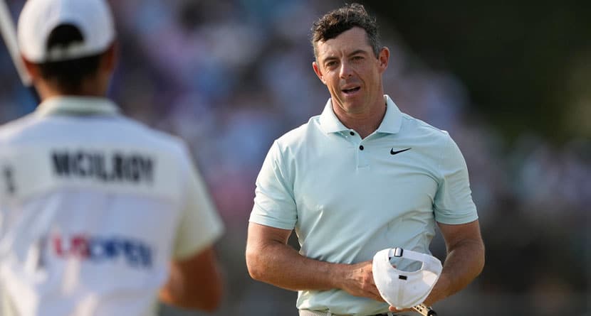 Rory McIlroy, of Northern Ireland, reacts after missing a putt on the 18th hole during the final round of the U.S. Open golf tournament Sunday, June 16, 2024, in Pinehurst, N.C. (AP Photo/Matt York)