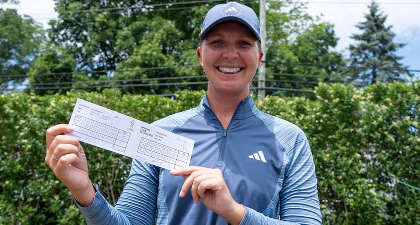 Linnea Strom, of Sweden, holds up her record setting scorecard during the final round of the LPGA Classic golf tournament, Sunday, June 9, 2024, in Galloway, N.J. Strom sets a tournament record with 11 under par. (AP Photo/Chris Szagola)