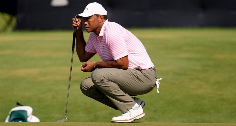 Tiger Woods lines up a putt on the 16th hole during the first round of the U.S. Open golf tournament Thursday, June 13, 2024, in Pinehurst, N.C. (AP Photo/Mike Stewart)