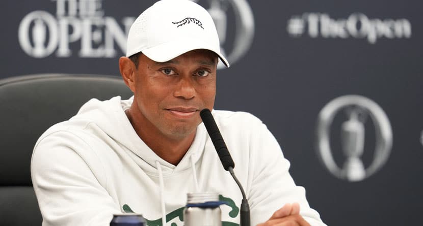 Tiger Woods of the United States answers questions at a press conference ahead of the British Open Golf Championships at Royal Troon golf club in Troon, Scotland, Tuesday, July 16, 2024. (AP Photo/Jon Super)