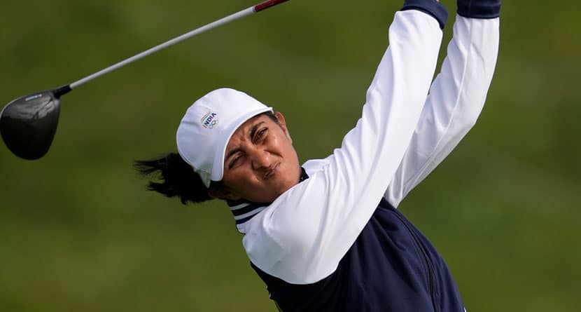 Aditi Ashok, of India, hits her shot from the 3rd tee during the first round of the women's golf event at the 2024 Summer Olympics, Wednesday, Aug. 7, 2024, at Le Golf National in Saint-Quentin-en-Yvelines, France. (AP Photo/George Walker IV)