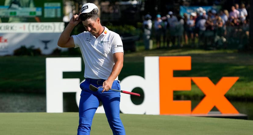 Viktor Hovland, of Norway, walks off the 18th green after the final round of the St. Jude Championship golf tournament Sunday, Aug. 18, 2024, in Memphis, Tenn. (AP Photo/Mark Humphrey)