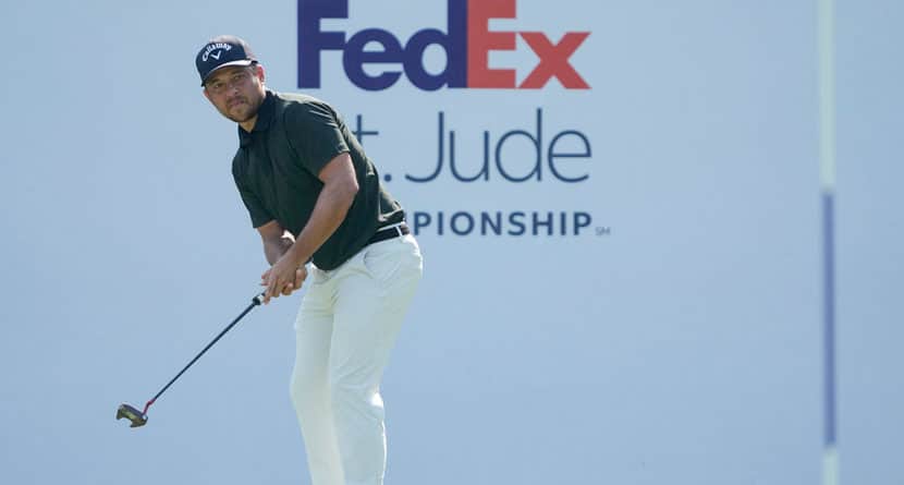 Xander Schauffele watches his putt on the 17th green during the final round of the St. Jude Championship golf tournament Sunday, Aug. 18, 2024, in Memphis, Tenn. (AP Photo/Mark Humphrey)