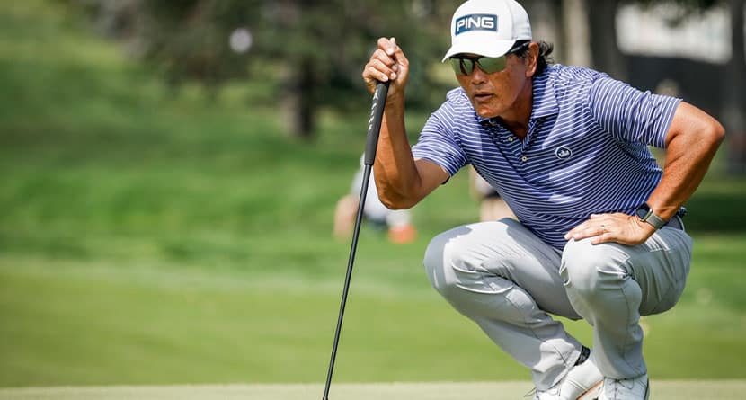 Ken Tanigawa, of the United States, lines up a putt on the seventh green during the final round of the PGA Tour Champions golf event in Calgary, Alberta, Sunday, Aug. 18, 2024. (Jeff McIntosh/The Canadian Press via AP)