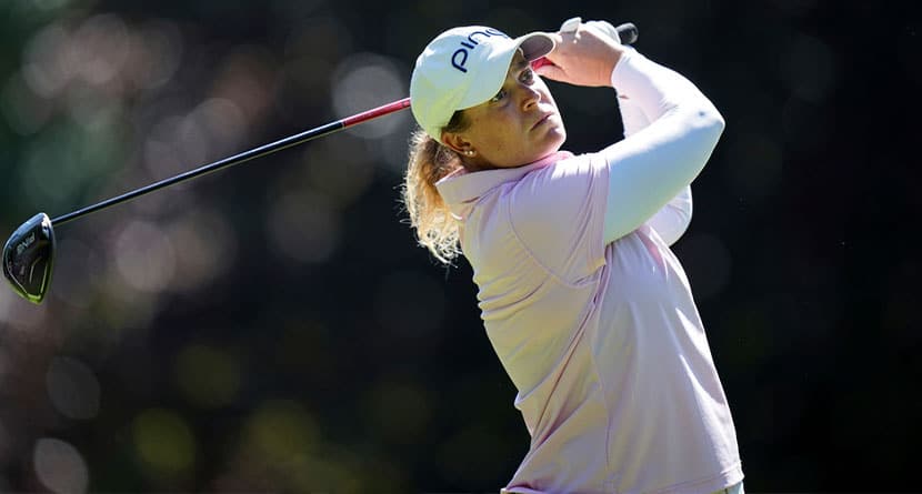 Lauren Coughlin, of USA, plays on the fourth hole during the last round of the Evian Championship women's golf tournament, in Evian, eastern France, Sunday, July 14, 2024. (AP Photo/Laurent Cipriani)