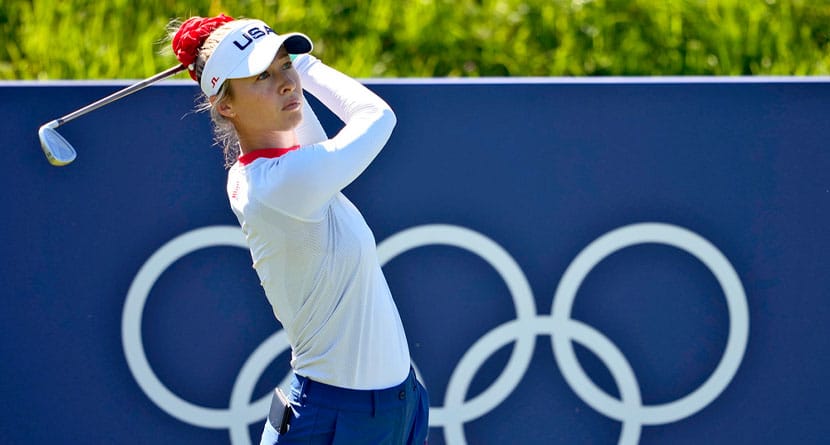 Nelly Korda, of the United States, hits from the eighth tee during a practice round for the women's golf event at the 2024 Summer Olympics, Monday, Aug. 5, 2024, at Le Golf National in Saint-Quentin-en-Yvelines, France. (AP Photo/Matt York)