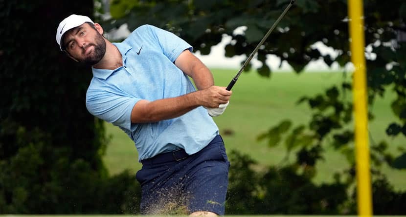 Scottie Scheffler hits onto a practice green at the St. Jude Championship golf tournament, Wednesday, Aug. 14, 2024, in Memphis, Tenn. The tournament is scheduled to begin Thursday. (AP Photo/Mark Humphrey)