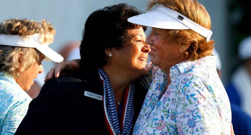 Nancy Lopez, front left, greets JoAnne Carner, right, during the first round of the inaugural U.S. Senior Women's Open golf tournament in Wheaton, Ill., July 12, 2018. Carner, at 85 years old, shot a 9-over 80 on Friday, Aug. 2, 2024, in the second round of the U.S. Senior Women’s Open at Fox Chapel in Pittsburgh. (Daniel White/Daily Herald via AP, File)