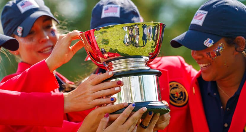 United States' reach for the Curtis Cup during the final day of the Curtis Cup amateur golf match against Great Britain and Ireland, Sunday, June 12, 2022, in Ardmore, Pa. The United States won 15.5-4.5 (AP Photo/Chris Szagola)