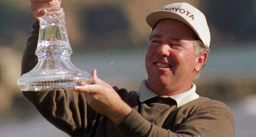 Mark O'Meara holds aloft the trophy after winning the AT&T Pebble Beach National Pro Am, Sunday, Feb. 2, 1997, at Pebble beach Golf Course. (AP Photo/Bob Galbraith, File)