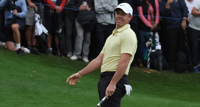 Rory McIlroy, of Northern Ireland, races after putting on the 18th green during a play off for the British PGA golf Championship, with Billy Horschel of the United States winning the playoff, at Wentworth golf club in Wentworth, England, Sunday, Sept. 22, 2024. (AP Photo/Ian Walton)