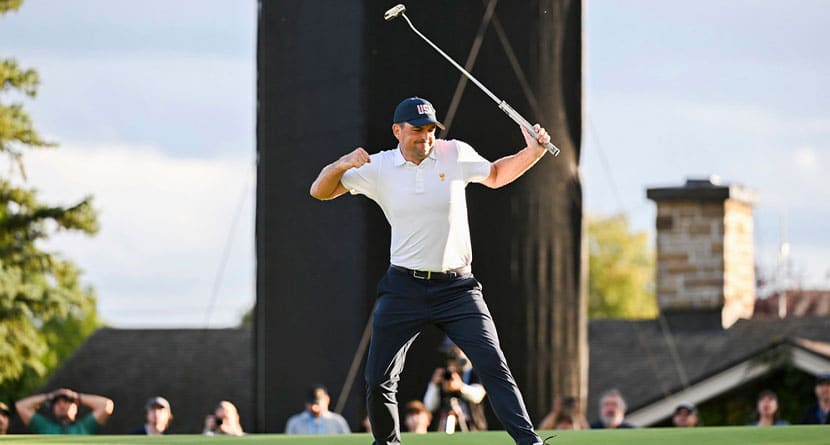 United States team member Keegan Bradley reacts on the 18th green after defeating the international team during a first-round four-ball match at the Presidents Cup golf tournament at the Royal Montreal Golf Club in Montreal, Thursday, Sept. 26, 2024. (Graham Hughes/The Canadian Press via AP)