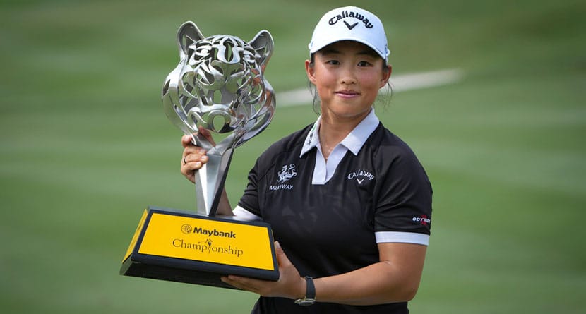 Yin Ruoning of China holds the winning trophy during the awards ceremony after winning the LPGA Tour's Maybank Championship at Kuala Lumpur Golf and Country club in Kuala Lumpur, Sunday, Oct. 27, 2024. (AP Photo/Vincent Thian)