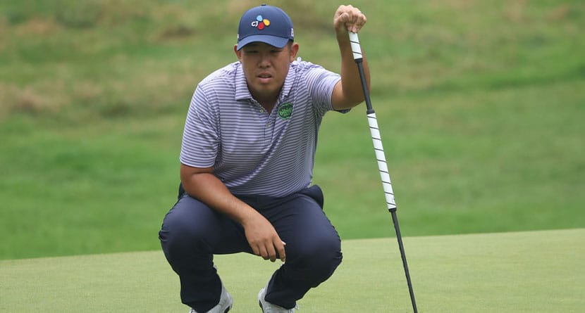 Byeong Hun An, of South Korea, looks at his putt on the 14th green during the final round of the British PGA golf Championship in Wentworth, England, Sunday, Sept. 22, 2024. (AP Photo/Ian Walton)